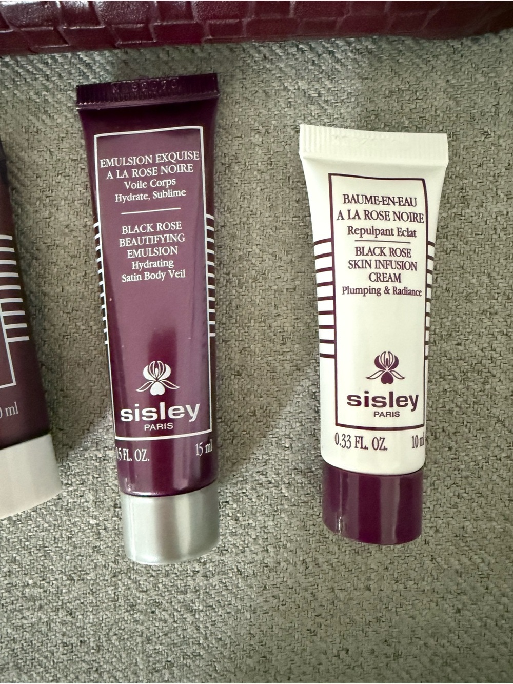 Sisley Woven Plum Cosmetic Clutch with Skincare samples - Picture 3 of 7